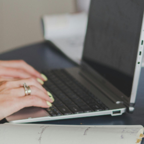 Computer with coffee. Photo credit: Pexels